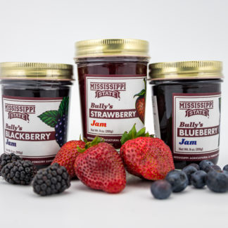 9 oz blackberry jam, 9 oz strawberry jam, 9 oz blueberry jam surrounded by fruit